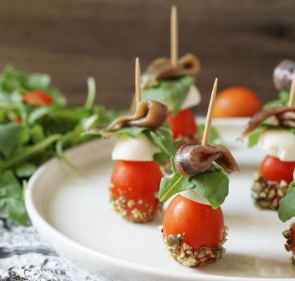 Christmas tomato, cheese and anchovy pintxo