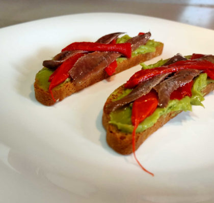 Guacamole, anchovy and piquillo pepper toast