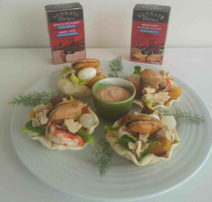 Christmas canapé of seafood and tuna in small baskets