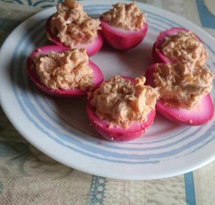 Pink eggs stuffed with Tuna